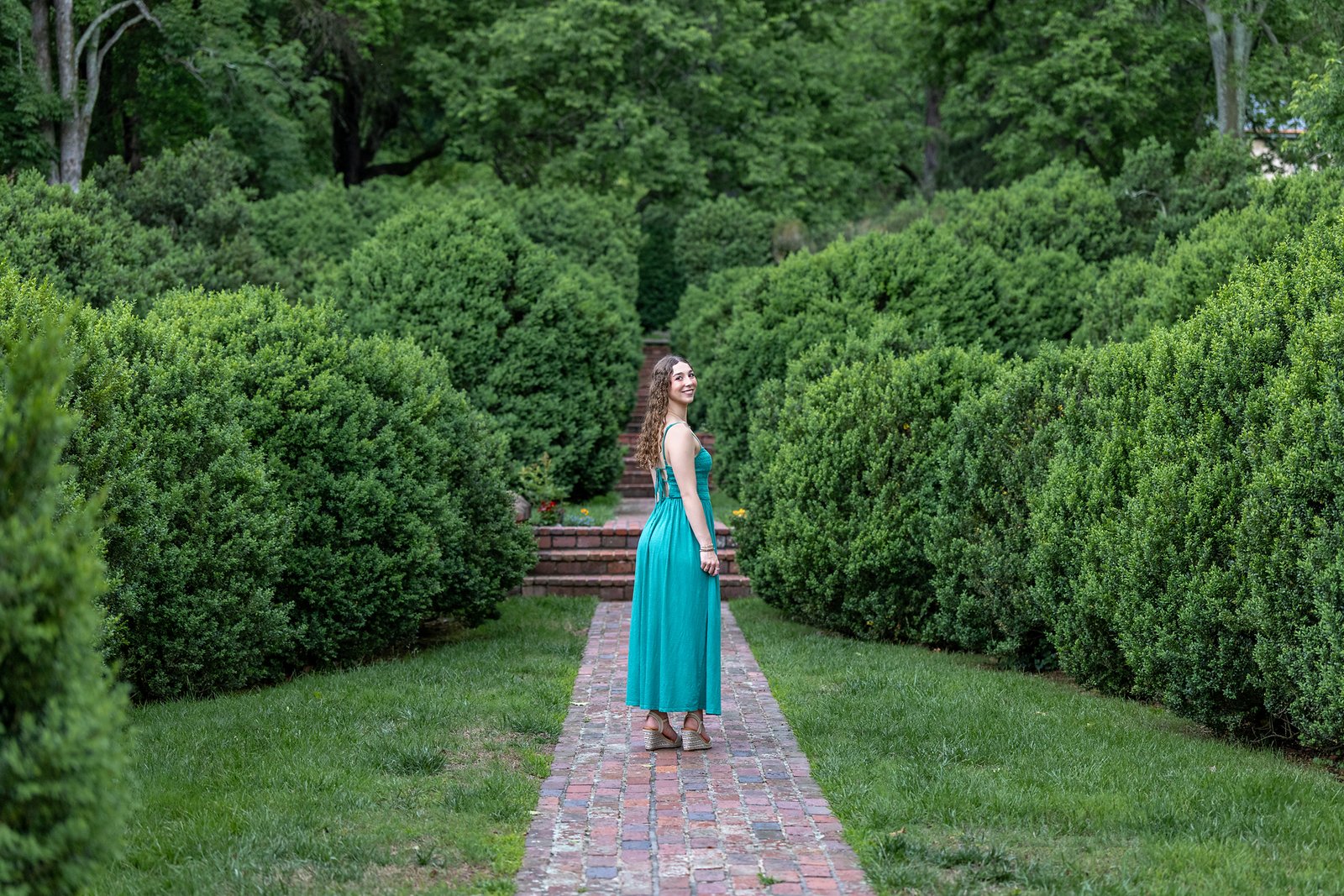 Brick walk way at Morven Park with beautiful green hedges in Leesburg, Virginia